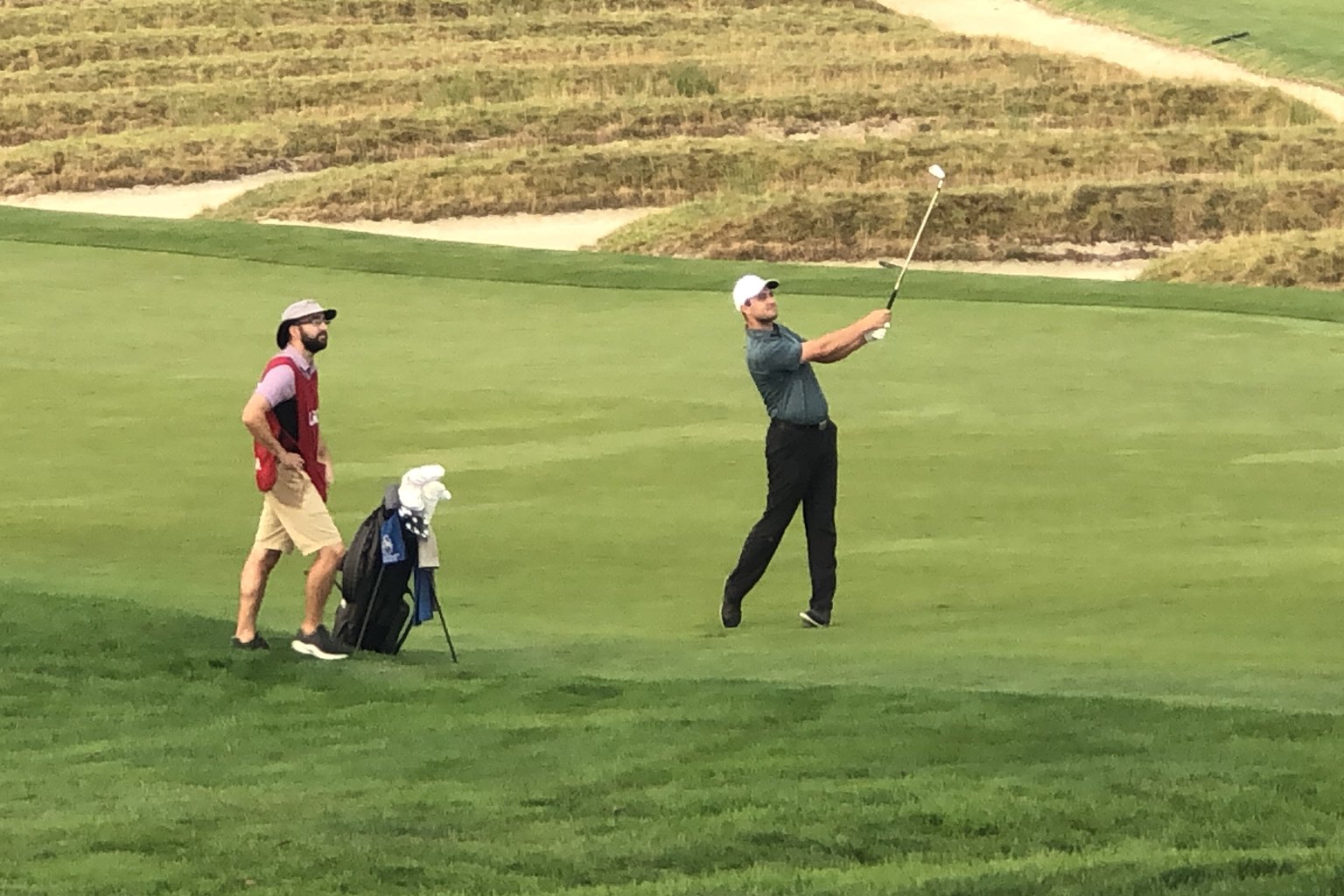 Corey Ghiringhelli hitting an approach shot